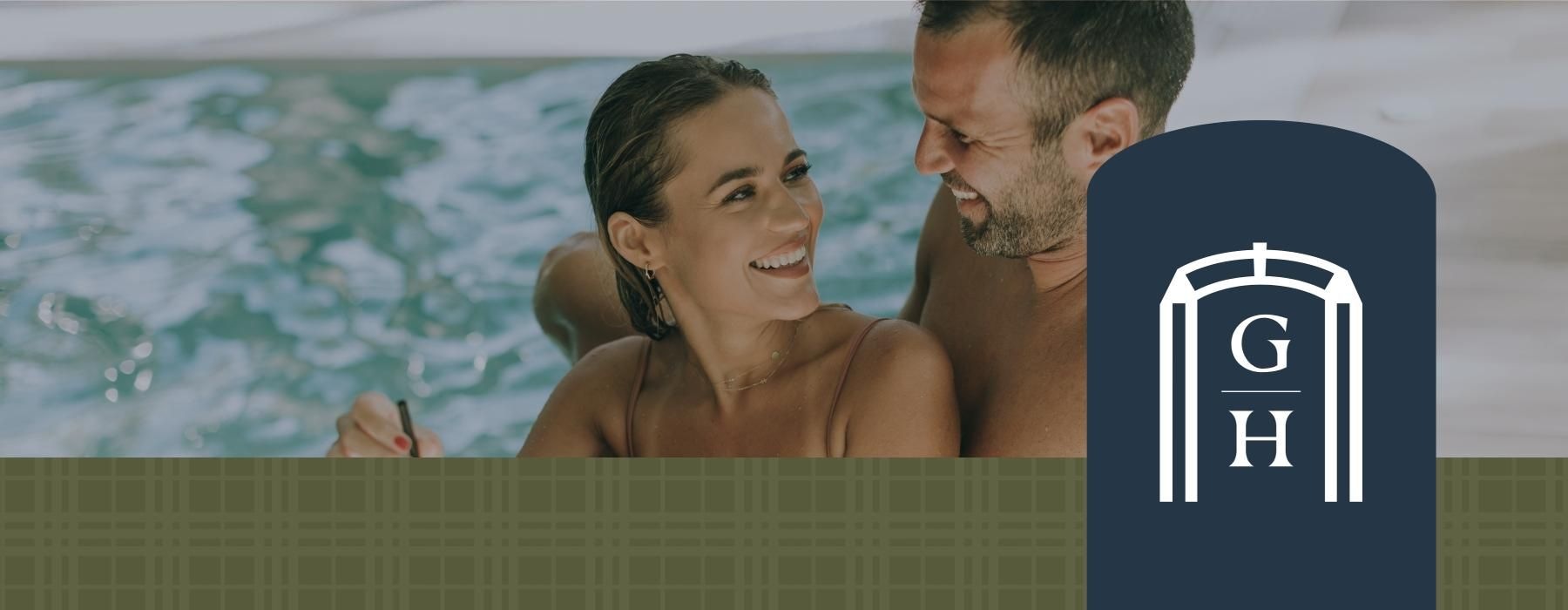 a man and woman in a pool