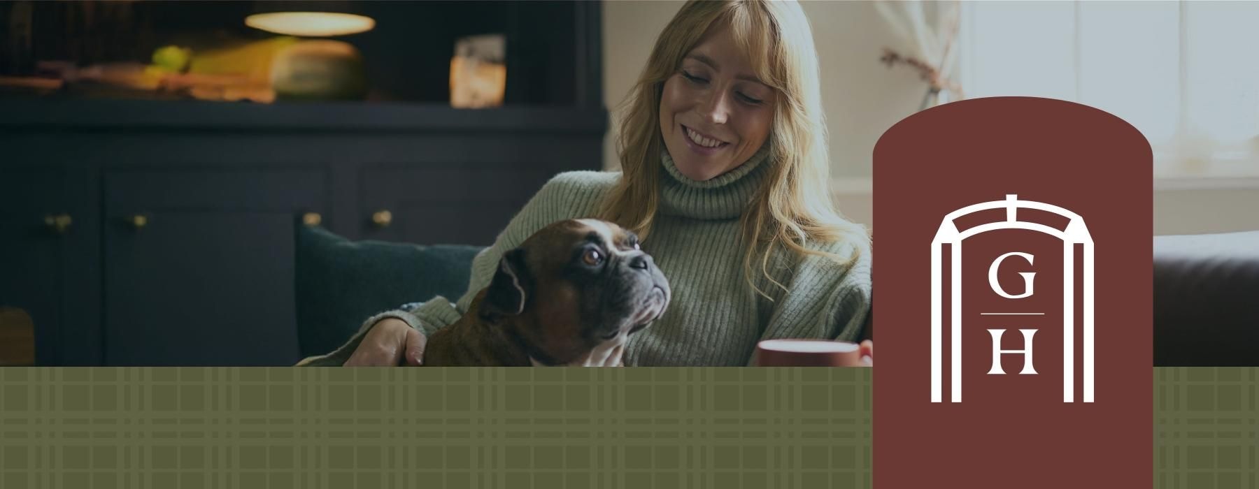 a person holding a dog